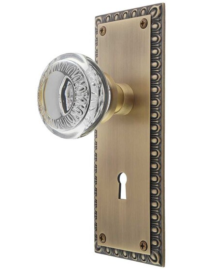 Ovolo Door Set with Ovolo Crystal-Glass Knobs and Keyhole in Antique Brass.